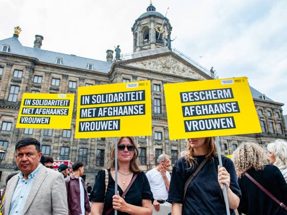 August 15, 2026, Amsterdam, Netherlands: Protesters hold placards during the rally. On the fifth anniversary of the Taliban™s capture of Kabul, in Afghanistan, several organizations held a demonstration to demand that the Netherlands and the EU stop legitimizing the Taliban and prioritize the rights of Afghan women. Under the Taliban, girls are barred from education beyond primary school, and women are banned from many jobs. There are laws dictating that women must cover their faces in public and forbidding them from entering public parks. Human rights groups call it gender apartheid. Amsterdam Netherlands  - ZUMAs197 20260815_aaa_s197_112 Copyright: xAnaxFernandezx