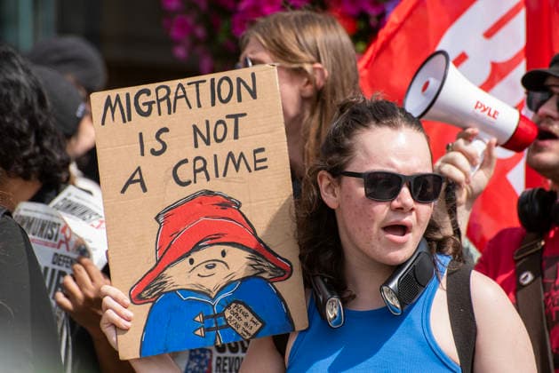 Britain First demo in Maidstone, UK - 15 Aug 2026 A counter-protester holds a placard and chants slogans during a demonstration. Around 150 supporters of the Britain First far-right party gathered in Maidstone, UK. The protesters marched through at the town centre led by Paul Golding the current leader of the party. Far-right campaigners were confronted by a group of anti-fascist counter-protesters on the way to the County Hall. Maidstone United Kingdom Copyright: xKrisztianxElekx xSOPAxImagesx SSS_20260815_COUNTER_PROTEST_0011005005