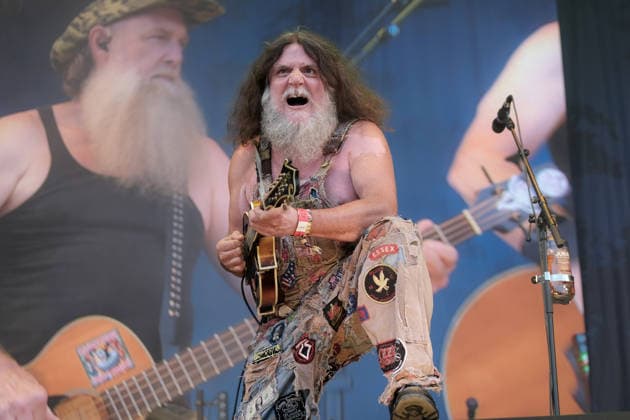 August 15, 2026, Williamscot, Oxfordshire, United Kingdom: English mandolin player and multi-instrumentalist Hippy Joe Hymas, also known as Joe Revolta performing live on stage at Fairport s Cropredy Convention with American Rockgrass band Hayseed Dixie. Formed in Nashville, Tennessee, in 2000,Hayseed Dixie is an American band that quoined the term rockgrass, which is hard rock and heavy metal songs played on traditional bluegrass instruments with. Their name is a parody of heavy metal band AC DC. The band consists of John Wheeler Barley Scotch on vocals, guitars, fiddle, keyboards, Hippy Joe Hymas on mandolin, acoustic guitar, vocals Jake Byers on bass, vocals Richard Collins on Banjo and vocals. Williamscot United Kingdom - ZUMAs197 20260815_aaa_s197_185 Copyright: xDawnxFletcher-Parkx