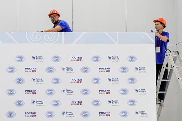 RUSSIA, REPUBLIC OF TATARSTAN - AUGUST 16, 2026: Workers in the Kazan Expo International Exhibition Centre in Bolshiye Kabany during the 4th Sprouts Business Forum titled Sprouts: Russia and China – Mutually Beneficial Cooperation scheduled for 16-19 August 2026. Yevgeny Messman TASS Host Photo Agency  96239123