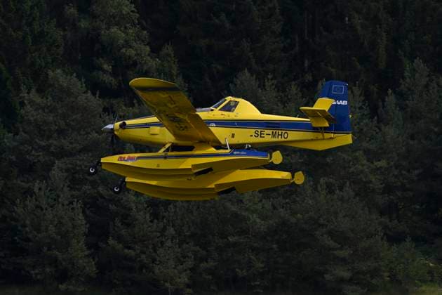 Fire in the Belgian High Fens JALHAY, BELGIUM - AUGUST 16 : A water bomber aircraft on the dam of Eupen during an important fire that has broken out in the Belgian High Fens on August 16, 2026 in Jalhay, Belgium, 16 08 2026 Jalhay Belgium  Copyright: xDhax