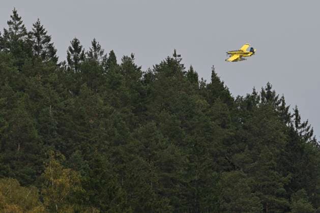 Fire in the Belgian High Fens JALHAY, BELGIUM - AUGUST 16 : A water bomber aircraft on the dam of Eupen during an important fire that has broken out in the Belgian High Fens on August 16, 2026 in Jalhay, Belgium, 16 08 2026 Jalhay Belgium  Copyright: xDhax