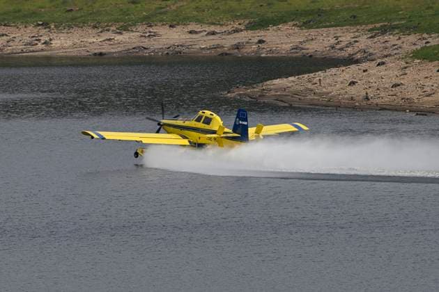 Fire in the Belgian High Fens JALHAY, BELGIUM - AUGUST 16 : A water bomber aircraft on the dam of Eupen during an important fire that has broken out in the Belgian High Fens on August 16, 2026 in Jalhay, Belgium, 16 08 2026 Jalhay Belgium  Copyright: xDhax