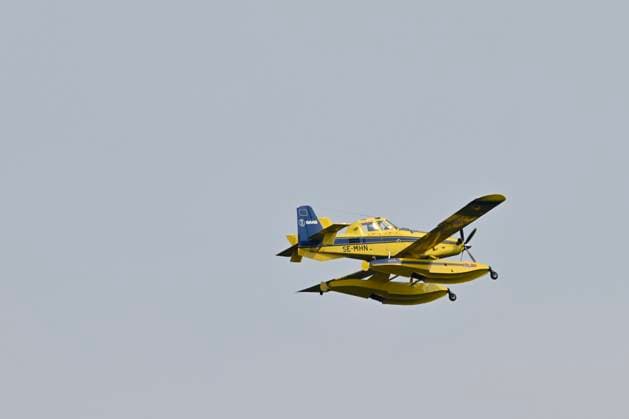 Fire in the Belgian High Fens JALHAY, BELGIUM - AUGUST 16 : A water bomber aircraft on the dam of Eupen during an important fire that has broken out in the Belgian High Fens on August 16, 2026 in Jalhay, Belgium, 16 08 2026 Jalhay Belgium  Copyright: xDhax