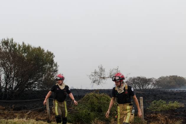 Emergency services pictured on the site, as a fire rages in the Hautes Fagnes (High Fens) nature reserve, on Sunday 16 August 2026 in Waimes. The fire started on August 14th and 2700 hectares (on a total of 4500) are impacted.  NICOLASxLAMBERT 183533008
