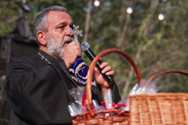 ARMENIA, YEREVAN - AUGUST 16, 2026: Priest Ter Zgon Abrahamyan speaks during in Yerevan Taraz Fest 2026, an annual festival promoting Armenian culture and traditional costumes. Alexander Patrin TASS  96253714