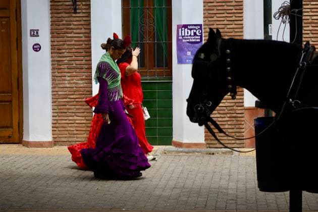 Scenes from the Málaga Fair: Several women dressed in flamenco gowns stroll through the Cortijo de Torres at the Málaga Fair. August 16, 2026, in Málaga, Andalusia, Spain. Locals and visitors enjoy the Málaga Fair at the fairgrounds. August 16, 2026, in Málaga, Andalusia, Málaga, Andalusia, Spain  Copyright: xÃlexxZeax 7716791