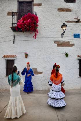 Scenes from the Málaga Fair: Several women dressed in flamenco gowns stroll through the Cortijo de Torres at the Málaga Fair. August 16, 2026, in Málaga, Andalusia, Spain. Locals and visitors enjoy the Málaga Fair at the fairgrounds. August 16, 2026, in Málaga, Andalusia, Málaga, Andalusia, Spain  Copyright: xÃlexxZeax 7716799