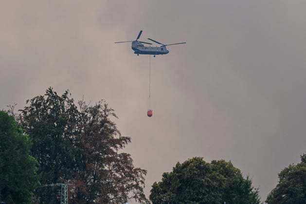 Fire in the Belgian High Fens JALHAY, BELGIUM - AUGUST 16 : A Boeng CH-47 Chinook Heloicopter in the air in Küchelscheid during an important fire that has broken out in the Belgian High Fens on August 16, 2026 in Jalhay, Belgium, 16 08 2026 Jalhay Belgium  Copyright: xDhax
