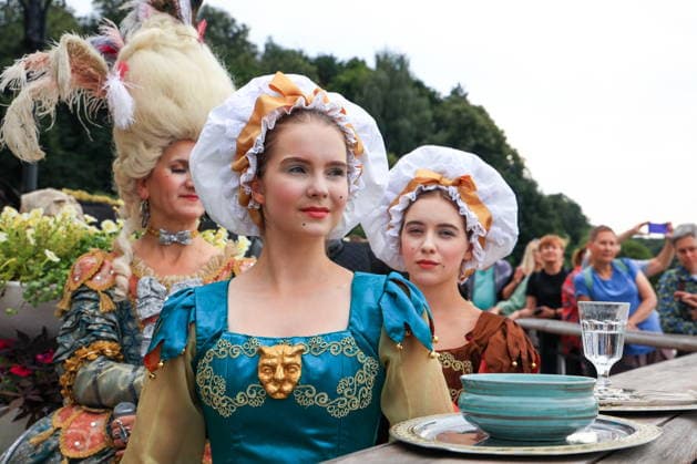 RUSSIA, MOSCOW - AUGUST 16, 2026: Participants in period costumes take part in a historical reenactment during the Tsaritsyno History Day festival at the Tsaritsyno Museum-Reserve. The event marks key moments from the summer of 1775, when Catherine the Great, the Empress of Russia, purchased the Chernaya Gryaz (future Tsaritsyno) estate, and the summer of 1787, when she visited the residence with her grandchildren during the 25th anniversary of her reign. Alyona Bzhakhova TASS  96253679