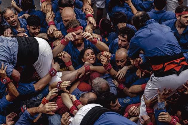 August 16, 2026, Barcelona, Catalonia, Spain: Members of the Castellers de la Vila de Gracia gather to form the pinya , the base that supports a human tower, during the Festa Major de Gro cia. Barcelona Spain - ZUMAo105 20260816_fap_o105_002 Copyright: xMatthiasxOesterlex