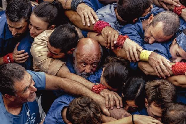 August 16, 2026, Barcelona, Catalonia, Spain: Members of the Castellers de la Vila de Gracia gather to form the pinya , the base that supports a human tower, during the Festa Major de Gro cia. Barcelona Spain - ZUMAo105 20260816_fap_o105_010 Copyright: xMatthiasxOesterlex