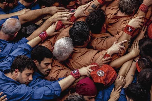 August 16, 2026, Barcelona, Catalonia, Spain: Members of the Castellers de la Vila de Gracia gather to form the pinya , the base that supports a human tower, during the Festa Major de Gro cia. Barcelona Spain - ZUMAo105 20260816_fap_o105_013 Copyright: xMatthiasxOesterlex