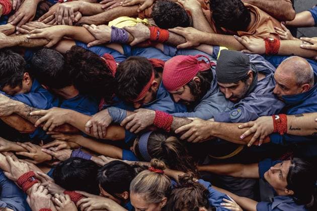 August 16, 2026, Barcelona, Catalonia, Spain: Members of the Castellers de la Vila de Gracia gather to form the pinya , the base that supports a human tower, during the Festa Major de Gro cia. Barcelona Spain - ZUMAo105 20260816_fap_o105_016 Copyright: xMatthiasxOesterlex