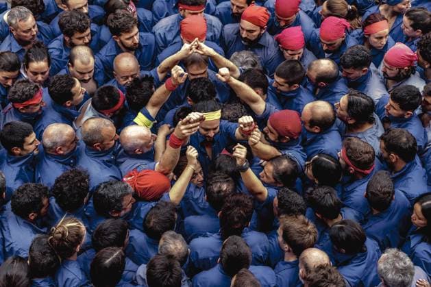 August 16, 2026, Barcelona, Catalonia, Spain: Members of the Castellers de la Vila de Gracia gather to form the pinya , the base that supports a human tower, during the Festa Major de Gro cia. Barcelona Spain - ZUMAo105 20260816_fap_o105_018 Copyright: xMatthiasxOesterlex