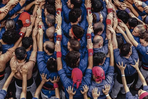 August 16, 2026, Barcelona, Catalonia, Spain: Members of the Castellers de la Vila de Gracia gather to form the pinya , the base that supports a human tower, during the Festa Major de Gro cia. Barcelona Spain - ZUMAo105 20260816_fap_o105_019 Copyright: xMatthiasxOesterlex