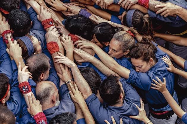 August 16, 2026, Barcelona, Catalonia, Spain: Members of the Castellers de la Vila de Gracia gather to form the pinya , the base that supports a human tower, during the Festa Major de Gro cia. Barcelona Spain - ZUMAo105 20260816_fap_o105_021 Copyright: xMatthiasxOesterlex