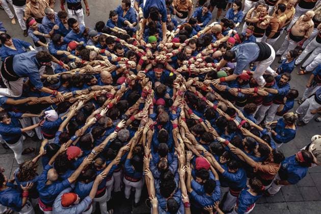 August 16, 2026, Barcelona, Catalonia, Spain: Members of the Castellers de la Vila de Gracia gather to form the pinya , the base that supports a human tower, during the Festa Major de Gro cia. Barcelona Spain - ZUMAo105 20260816_fap_o105_029 Copyright: xMatthiasxOesterlex