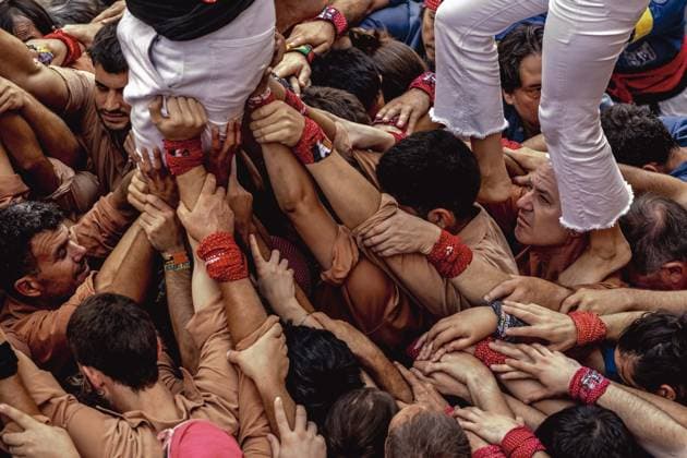 August 16, 2026, Barcelona, Catalonia, Spain: Members of the Xiquets de Reus gather to form the pinya , the base that supports a human tower, during the Festa Major de Gro cia. Barcelona Spain - ZUMAo105 20260816_fap_o105_037 Copyright: xMatthiasxOesterlex