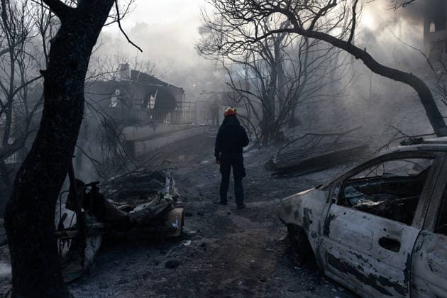 Wildfire kills 2 on Greek island of Salamina near Athens ATHENS, GREECE - AUGUST 16: Firefighters try to extinguish a wildfire which broke out on the island of Salamina, west of Athens, Greece, on August 16, 2026. Two people were found dead in a forested area of Peristeria on the Greek island of Salamina, where a wildfire broke out around noon Sunday, local media reported. Costas Baltas Anadolu Athens Greece. Editorial use only. Please get in touch for any other usage.  Copyright: x2026xAnadoluxCostasxBaltasx