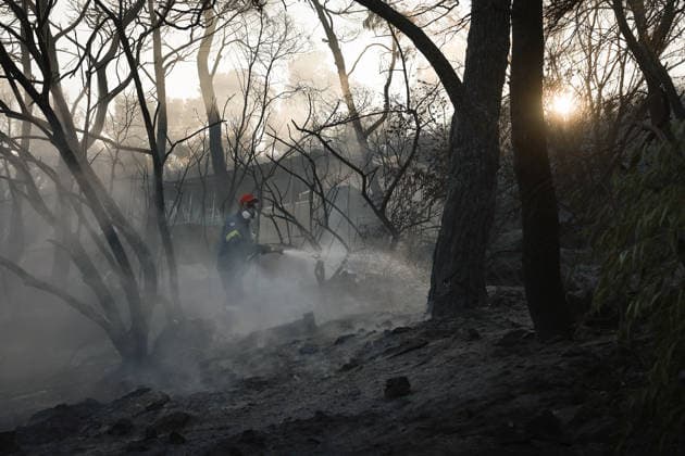 Wildfire kills 2 on Greek island of Salamina near Athens ATHENS, GREECE - AUGUST 16: Firefighters try to extinguish a wildfire which broke out on the island of Salamina, west of Athens, Greece, on August 16, 2026. Two people were found dead in a forested area of Peristeria on the Greek island of Salamina, where a wildfire broke out around noon Sunday, local media reported. Costas Baltas Anadolu Athens Greece. Editorial use only. Please get in touch for any other usage.  Copyright: x2026xAnadoluxCostasxBaltasx