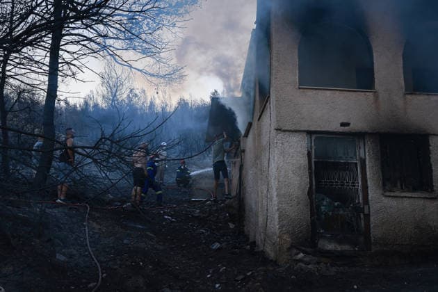 Wildfire kills 2 on Greek island of Salamina near Athens ATHENS, GREECE - AUGUST 16: Firefighters try to extinguish a wildfire which broke out on the island of Salamina, west of Athens, Greece, on August 16, 2026. Two people were found dead in a forested area of Peristeria on the Greek island of Salamina, where a wildfire broke out around noon Sunday, local media reported. Costas Baltas Anadolu Athens Greece. Editorial use only. Please get in touch for any other usage.  Copyright: x2026xAnadoluxCostasxBaltasx