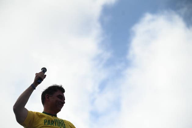 Flavio Bolsonaro addresses supporters at campaign rally in Rio de Janeiro RIO DE JANEIRO, BRAZIL - AUGUST 16: Brazilian presidential candidate Flavio Bolsonaro is set to officially launch his presidential campaign with a rally at Copacabana Beach in Rio de Janeiro, Brazil, on August 16, 2026. The rally is expected to draw a large number of supporters. Brazil s Military Police is expected to reinforce security measures along the beachfront due to the expected crowd and the potential impact of the event on traffic and public circulation. Copacabana Beach has previously hosted demonstrations in support of Flavio Bolsonaro s father, former President Jair Bolsonaro, and is closely associated with the Bolsonaro family s political base in Rio de J  Copyright: x2026xAnadoluxFabioxTeixeirax