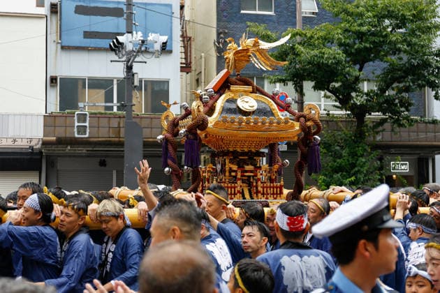 Fukagawa Hachiman Festival 2026 in Tokyo Japan - 16 AUG 2026. Participants seen carrying a heavily decorated mikoshi (portable shrine) in Koto Ward during the Fukagawa Hachiman Festival. The triennial festival is one of Tokyo s top three major Edo-period festivals held at Tomioka Hachimangu Shrine. It is well known as the Water-Splashing Festival (Mizukake Matsuri), where participants toss gallons of purifying water onto shrine bearers to beat the intense midsummer heat and bless the local community. Tokyo Japan Copyright: xRodrigoxReyesxMarinx xSOPAxImagesx 20260816_RodrigoRMarin_FukagawaHachimanFest007