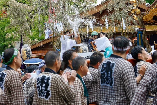 Fukagawa Hachiman Festival 2026 in Tokyo Japan - 16 AUG 2026. Participants seen during Fukagawa Hachiman Festival to carry a heavily decorated mikoshi (portable shrine) in Koto Ward. The triennial festival is one of Tokyo s top three major Edo-period festivals held at Tomioka Hachimangu Shrine. It is well known as the Water-Splashing Festival (Mizukake Matsuri), where participants toss gallons of purifying water onto shrine bearers to beat the intense midsummer heat and bless the local community. Tokyo Japan Copyright: xRodrigoxReyesxMarinx xSOPAxImagesx 20260816_RodrigoRMarin_FukagawaHachimanFest038