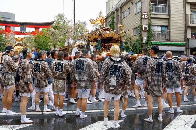 August 16, 2026, Tokyo, Japan: Participants seen during Fukagawa Hachiman Festival to carry a heavily decorated mikoshi (portable shrine) in Koto Ward. The triennial festival is one of Tokyo s top three major Edo-period festivals held at Tomioka Hachimangu Shrine. It is well known as the Water-Splashing Festival (Mizukake Matsuri), where participants toss gallons of purifying water onto shrine bearers to beat the intense midsummer heat and bless the local community. Tokyo Japan - ZUMAs197 20260816_aaa_s197_061 Copyright: xRodrigoxReyesxMarinx