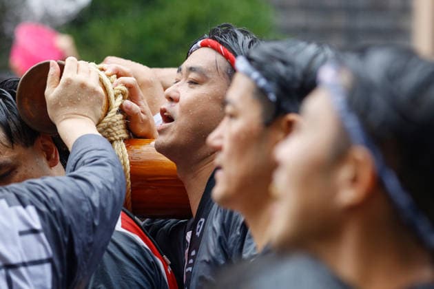 August 16, 2026, Tokyo, Japan: People seen in Koto Ward during the Fukagawa Hachiman Festival. The triennial festival is one of Tokyo s top three major Edo-period festivals held at Tomioka Hachimangu Shrine. It is well known as the Water-Splashing Festival (Mizukake Matsuri), where participants toss gallons of purifying water onto shrine bearers to beat the intense midsummer heat and bless the local community. Tokyo Japan - ZUMAs197 20260816_aaa_s197_063 Copyright: xRodrigoxReyesxMarinx
