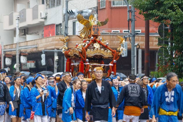August 16, 2026, Tokyo, Japan: Participants seen carrying a heavily decorated mikoshi (portable shrine) through a cascade of splashing water in Koto Ward during the Fukagawa Hachiman Festival. The triennial festival is one of Tokyo s top three major Edo-period festivals held at Tomioka Hachimangu Shrine. It is well known as the Water-Splashing Festival (Mizukake Matsuri), where participants toss gallons of purifying water onto shrine bearers to beat the intense midsummer heat and bless the local community. Tokyo Japan - ZUMAs197 20260816_aaa_s197_068 Copyright: xRodrigoxReyesxMarinx