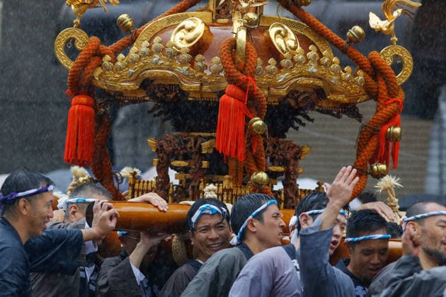 August 16, 2026, Tokyo, Japan: Participants seen carrying a heavily decorated mikoshi (portable shrine) in Koto Ward during the Fukagawa Hachiman Festival. The triennial festival is one of Tokyo s top three major Edo-period festivals held at Tomioka Hachimangu Shrine. It is well known as the Water-Splashing Festival (Mizukake Matsuri), where participants toss gallons of purifying water onto shrine bearers to beat the intense midsummer heat and bless the local community. Tokyo Japan - ZUMAs197 20260816_aaa_s197_078 Copyright: xRodrigoxReyesxMarinx