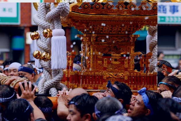 August 16, 2026, Tokyo, Japan: Participants seen carrying a heavily decorated mikoshi (portable shrine) in Koto Ward during the Fukagawa Hachiman Festival. The triennial festival is one of Tokyo s top three major Edo-period festivals held at Tomioka Hachimangu Shrine. It is well known as the Water-Splashing Festival (Mizukake Matsuri), where participants toss gallons of purifying water onto shrine bearers to beat the intense midsummer heat and bless the local community. Tokyo Japan - ZUMAs197 20260816_aaa_s197_083 Copyright: xRodrigoxReyesxMarinx