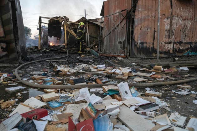 Russian Attack Destroys Ukraine s Largest Book Market In Kyiv Firefighters work to extinguish a fire at a book market in Kyiv, Ukraine, on August 16, 2026. The fire broke out after Russia attacked Kyiv overnight with ballistic missiles and jet-powered attack drones, destroying one of Ukraine s largest book markets. Two people were reported injured. Kyiv Ukraine  Copyright: xMaxymxMarusenkox originalFilename: musiienko-notitle260816_npCKZ.jpg