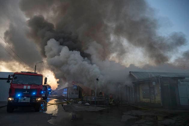Russian Attack Destroys Ukraine s Largest Book Market In Kyiv Firefighters work to extinguish a fire at a book market in Kyiv, Ukraine, on August 16, 2026. The fire broke out after Russia attacked Kyiv overnight with ballistic missiles and jet-powered attack drones, destroying one of Ukraine s largest book markets. Two people were reported injured. Kyiv Ukraine  Copyright: xMaxymxMarusenkox originalFilename: musiienko-notitle260816_npn0S.jpg