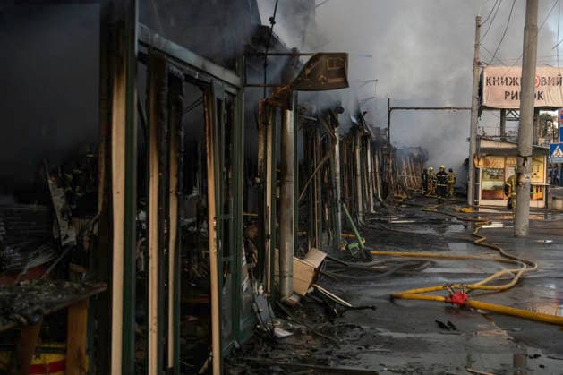 Russian Attack Destroys Ukraine s Largest Book Market In Kyiv Firefighters work to extinguish a fire at a book market in Kyiv, Ukraine, on August 16, 2026. The fire broke out after Russia attacked Kyiv overnight with ballistic missiles and jet-powered attack drones, destroying one of Ukraine s largest book markets. Two people were reported injured. Kyiv Ukraine  Copyright: xMaxymxMarusenkox originalFilename: musiienko-notitle260816_np8yf.jpg