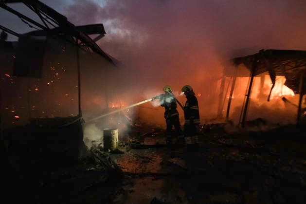Russian Attack Destroys Ukraine s Largest Book Market In Kyiv Firefighters work to extinguish a fire at a book market in Kyiv, Ukraine, on August 16, 2026. The fire broke out after Russia attacked Kyiv overnight with ballistic missiles and jet-powered attack drones, destroying one of Ukraine s largest book markets. Two people were reported injured. Kyiv Ukraine  Copyright: xMaxymxMarusenkox originalFilename: musiienko-notitle260816_npcOw.jpg