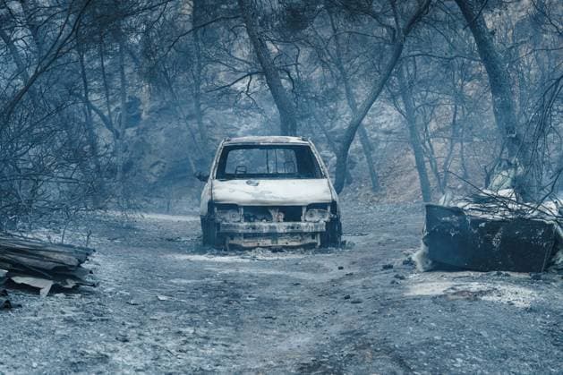 August 16, 2026, Salamina, Greece: PERISTERIA, SALAMINA, GREECE, AUGUST 16, 2026: Dozens of homes and businesses burn as a wildfire rages through the forested area of Peristeria on the island of Salamina, west of Athens. The fire prompted mass evacuations and resulted in two deaths and multiple injuries, according to local authorities. Salamina Greece - ZUMAq101 20260816_zna_q101_042 Copyright: xRomanosxLioutasx