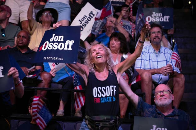 August 16, 2026, Atlanta, Georgia, USA: A supporter dances to the music before a capacity-crowd rally in Atlanta Sunday for Sen. Jon Ossoff, Atlanta USA - ZUMAn03_ 20260816_zaf_n03_015 Copyright: xRobinxRaynex