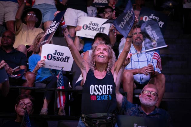 August 16, 2026, Atlanta, Georgia, USA: A supporter dances to the music before a capacity-crowd rally in Atlanta Sunday for Sen. Jon Ossoff, Atlanta USA - ZUMAn03_ 20260816_zaf_n03_016 Copyright: xRobinxRaynex
