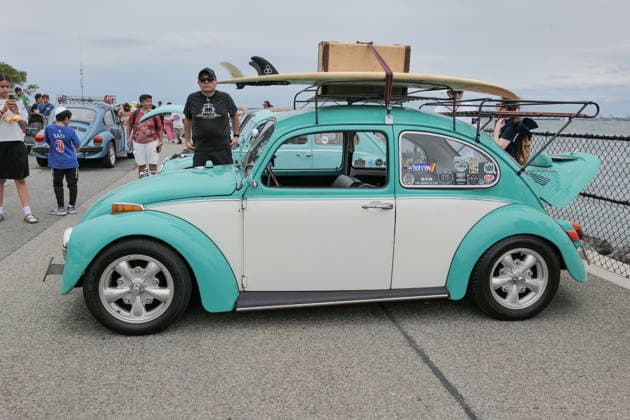 August 16, 2026, New York, New York, USA: Surf ready Bettle at VW Gridlock on Governors Island. The vintage Volkswagen show returned to .the island across from the Lower Manhattan skyline. The collection of about 75 vintage epic.Volkswagens from across the years with models the Beetle, Bus, Karmann Ghia and Thing .were parked along the waterside at Picnic Point for visitors to enjoy, admire and photograph. New York USA  - ZUMAh156 20260816_znp_h156_003 Copyright: xMiloxHessx