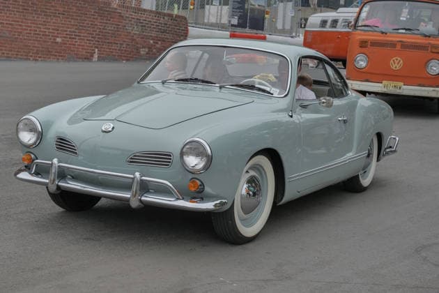 August 16, 2026, New York, New York, USA: Karmann Ghia at VW Gridlock on Governors Island. The vintage Volkswagen show returned to .the island across from the Lower Manhattan skyline. The collection of about 75 vintage epic.Volkswagens from across the years with models the Beetle, Bus, Karmann Ghia and Thing .were parked along the waterside at Picnic Point for visitors to enjoy, admire and photograph. New York USA  - ZUMAh156 20260816_znp_h156_014 Copyright: xMiloxHessx
