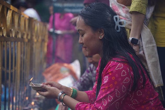 August 17, 2026, Kathmandu, Bagmati, Nepal: The Naag Panchami festival is being celebrated today with traditional worship and offerings to serpents. Observed annually on the fifth day of the bright fortnight of the month of Shrawan, this festival involves pasting images of serpents on the main entrance of homes and visiting serpent ponds (Naagdah) for worship. A woman praying to the Serpent Deity. Kathmandu Nepal  - ZUMAa308 20260817_znp_a308_005 Copyright: xChandraxBahadurxAlex