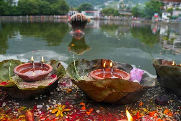August 17, 2026, Kathmandu, Nepal: KATHMANDU, NEPAL Ã¢â‚¬ AUGUST 17, 2026: Hindu devotees offer prayers to a statue representing Nag, a serpent deity, at Taudaha Pond in Kathmandu, Nepal, on August 17, 2026, during celebrations of Nag Panchami. The Hindu festival, observed during the monsoon season, is dedicated to the worship of serpent deities, with devotees making prayers and ritual offerings. Kathmandu Nepal - ZUMAq101 20260817_zna_q101_003 Copyright: xSunilxPradhanx