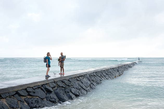 August 16, 2026, Honolulu, Hawaii, USA: Tropical storm LalaÃ¢â‚¬â ¢s worst affected Oahu and Waikiki beginning after 1:00 a.m. Sunday August 16, 2026 and lasted, tapering, through mid-afternoon leaving behind flooding, downed trees, and more than 130,000 Hawaiian Electric customers without power at 4:00 p.m. But at sunset Waikiki Beach was packed with people taking advantage of a brief respite from the rain that the National Weather Service forecasts will last through the week as the slow-moving storm moves Northwest beneath the Hawaiian archipelago. Schools, government offices and many businesses will remain closed on Monday as people on OÃ¢â‚¬Ëœahu sort through the stormÃ¢â‚¬â ¢s consequences. Honolulu USA - ZUMAm255 20260816_znp_m255_001 Copyright: xJ.xMattx