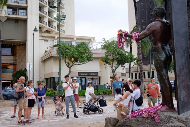 August 16, 2026, Honolulu, Hawaii, USA: Tropical storm LalaÃ¢â‚¬â ¢s worst affected Oahu and Waikiki beginning after 1:00 a.m. Sunday August 16, 2026 and lasted, tapering, through mid-afternoon leaving behind flooding, downed trees, and more than 130,000 Hawaiian Electric customers without power at 4:00 p.m. But at sunset Waikiki Beach was packed with people taking advantage of a brief respite from the rain that the National Weather Service forecasts will last through the week as the slow-moving storm moves Northwest beneath the Hawaiian archipelago. Schools, government offices and many businesses will remain closed on Monday as people on OÃ¢â‚¬Ëœahu sort through the stormÃ¢â‚¬â ¢s consequences. Honolulu USA - ZUMAm255 20260816_znp_m255_009 Copyright: xJ.xMattx