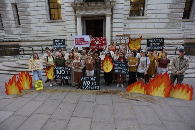 Fossil Free London Crop Failure Protest outside the Treasury, London, UK 17 August 2026 Campaigners stage a protest outside the Treasury on Horse Guards Road, London, UK, on 17 August 2026, calling on Prime Minister Andy Burnham to reject the Rosebank oil field as the public consultation closes. Holding empty harvesting baskets and hessian bags labelled Wheat - Failed , the protesters highlight the connection between fossil fuel extraction and the crop failures resulting from climate-driven heatwaves and droughts., Credit:PETE SPELLER Avalon UK, London  Copyright: xPETExSPELLERx xAvalonx 1124555548