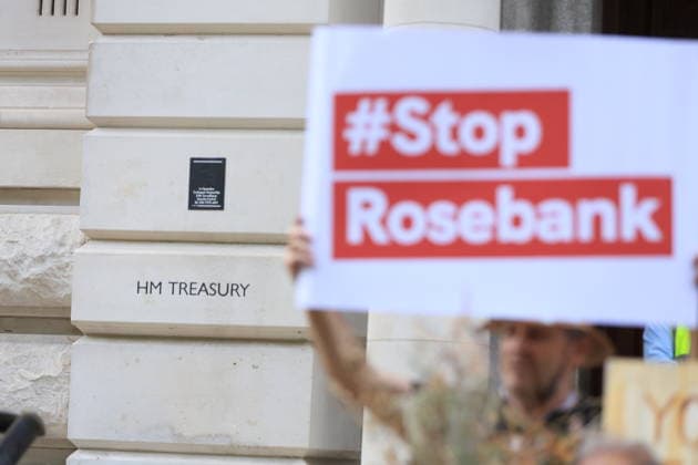 Fossil Free London Crop Failure Protest outside the Treasury, London, UK 17 August 2026 Campaigners stage a protest outside the Treasury on Horse Guards Road, London, UK, on 17 August 2026, calling on Prime Minister Andy Burnham to reject the Rosebank oil field as the public consultation closes. Holding empty harvesting baskets and hessian bags labelled Wheat - Failed , the protesters highlight the connection between fossil fuel extraction and the crop failures resulting from climate-driven heatwaves and droughts., Credit:PETE SPELLER Avalon UK, London  Copyright: xPETExSPELLERx xAvalonx 1124555614