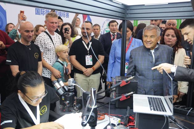 RUSSIA, REPUBLIC OF TATARSTAN - AUGUST 17, 2026: Rustam Minnikhanov (2nd R front), Head of the Republic of Tatarstan, Chairman of the Association of Innovative Regions of Russia, views Russia-China Expo during the 2026 Russia-China Business Forum titled Sprouts: Russia and China – Mutually Beneficial Cooperation and held at the Kazan Expo International Exhibition Centre in Bolshiye Kabany, southeast of Kazan. Yegor Aleyev TASS Host Photo Age  96295894